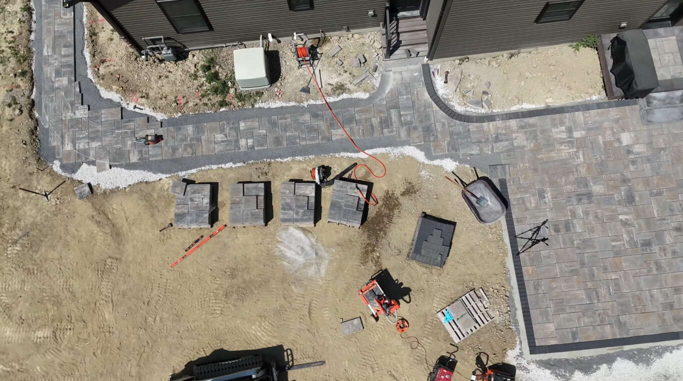 Aerial view of professional paver and concrete installation showing attention to detail